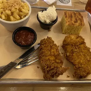 Two strip meal with Mac and cheese and cornbread