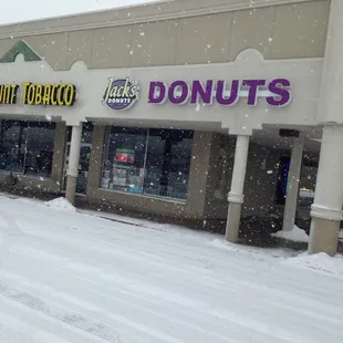 the outside of a donut shop