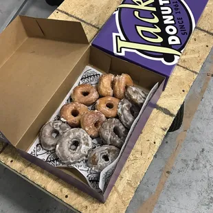 Boxes are huge - could probably fit two dozen but they only put one. This is a mix of regular and chocolate yeast donuts.