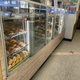 a display case filled with donuts