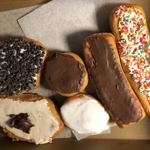 L to R: chocolate chip, peanut butter, white fluff, strawberry, chocolate stick, sprinkle stick.