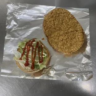 Tenderloin sandwich with ketchup mayo and lettuce