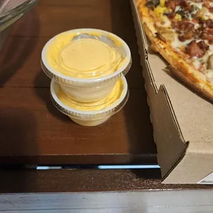 3.50 for two small cups of cheese after spending 30.00. Sad