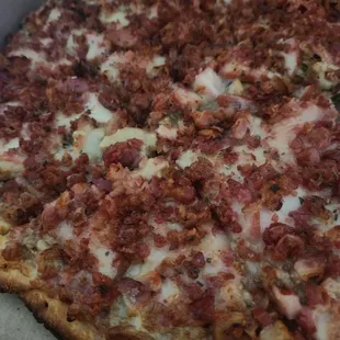 All meat pizza with extra  bacon