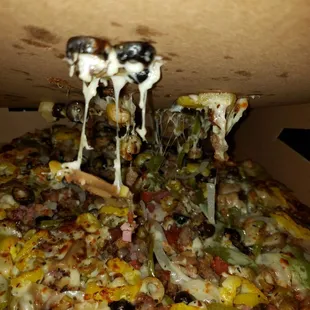 a slice being taken out of a box