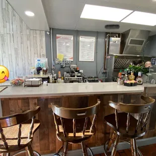 Bar to sit at to eat, there are 4 tables. Limited seating but so quaint! It&apos;s adorable!