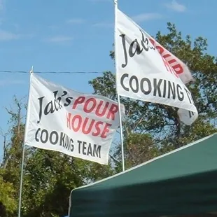 two flags on a roof