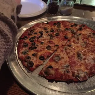 Tasty super thin crust pepperoni, mushroom and olive pizza. Yeah buddy.