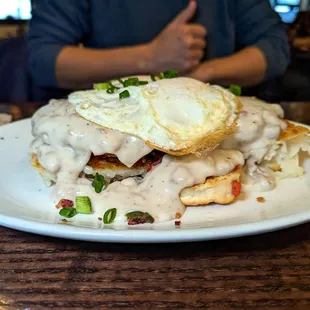 Mighty moose (country fried steak, hash browns, bacon, eggs, biscuits) $22