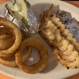 Grilled Shrimp Skewers, Onion Rings, Baked Potato.