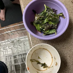 a bowl of greens in a dishwasher