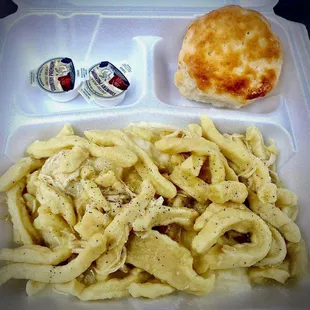 a tray of pasta and a pastry