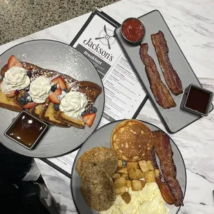 The Hub City Plate + pancake + french toast + additional serving of candied bacon &amp; chicken sausage