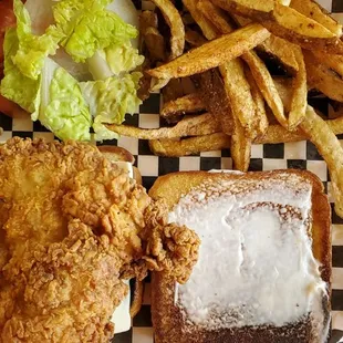 Chicken breast sandwich with grilled Butter Texas toast with Home style French fries.
