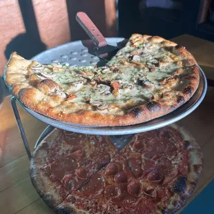 Mushroom pizza on top, classic pepperoni on bottom