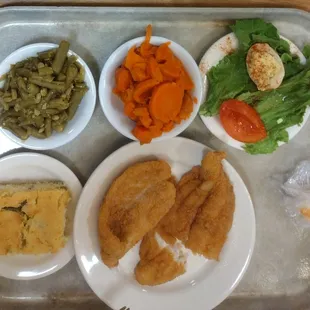 fried fishes with carrots and green beans plus southern cornbread and deviled eggs...