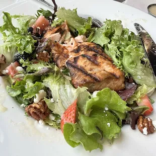 Salad topped with salmon