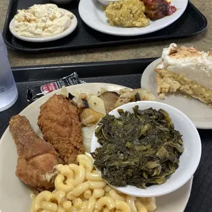 Mac n cheese, greens, yams, fried chicken, meatloaf, coconut pie, banana pudding, fried potatoes, green beans, dressing.