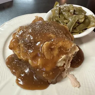Open faced turkey sandwiches with mashed potatoes and gravy. The side of green beans were delicious.