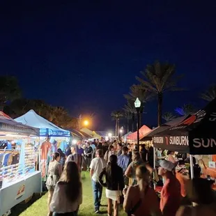 a crowd of people walking around