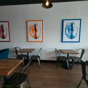 tables and chairs in a coffee shop