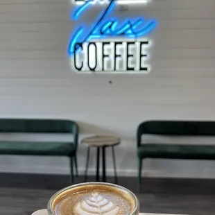 a cup of coffee on a table