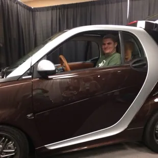 My 6'5" hubby actually fits in the Smart Car!
