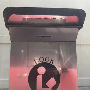 This thing is tall, y'all. If you drive a little car, like me, you have to get out to reach the book drop opening!