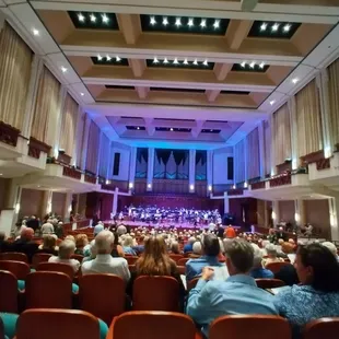 a large auditorium full of people