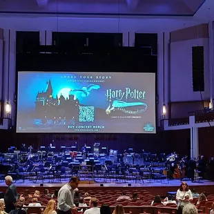 a large screen in a concert hall
