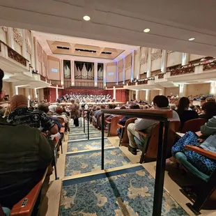 audience seated in auditorium