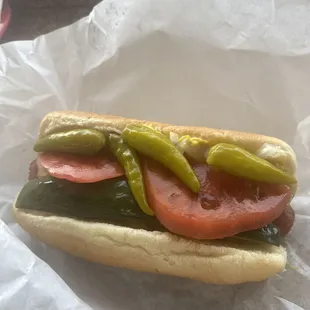Hot dog with tasty toppings, no ketchup needed.