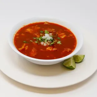 a bowl of soup on a plate