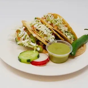 a plate of tacos