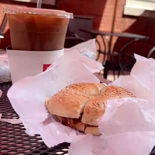 Iced latte and bagel breakfast sandwich