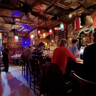 people sitting at the bar