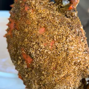 a close up of a cooked crab