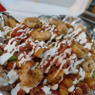 Taco salad with shrimp at it