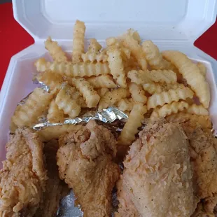 Crispy Chicken Wings &amp; Seasoned Fries.