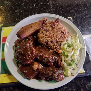 Oxtail with rice and peas