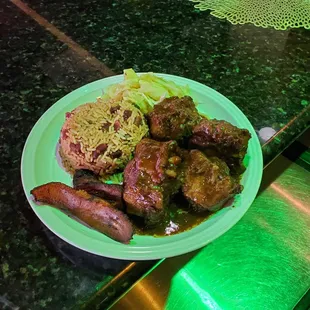 Oxtails with rice and peas