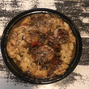 I took this home to eat so the photo doesn't do it justice but the Cajun Shrimp and Grits (served Sundays) SO GOOD!