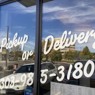 the reflection of a car in the window