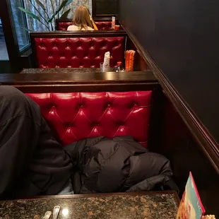 It's really a takeaway place. But there are three very comfortable booths big enough for a party of 4 in each.