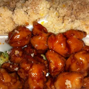 chicken and rice in a styrofoam container