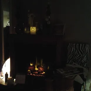 My messy fireplace in August!Waiting on my favorite spicey Jade cafe dishes.I love them and their fast .