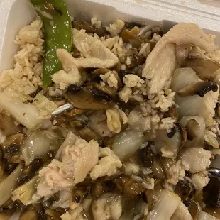 Moo goo Gai Pan. Note all of the mushrooms and the piece of undercooked chicken (cut it open) in the bottom left.