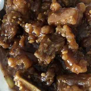 Bar - b - q Spare Ribs Way too much sauce and they're tough