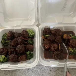 two takeout containers of beef and broccoli