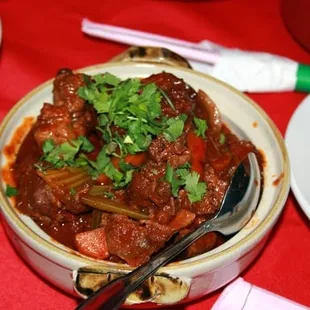 Stewed oxtail in red wine reduction sauce! Yummy!